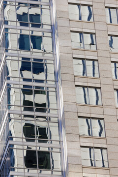View of contrasting Sydney facades with distorted reflections