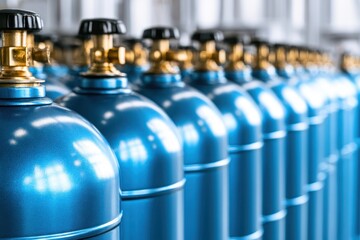 Fototapeta premium Blue oxygen tanks. Bundle of gas cylinder and high pressure gauges, meter, valve. Many argon cylinders with compressed gas for industry, welding. Fuel manufacturing. Liquefied gas production, factory