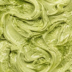 Fototapeta premium Matcha Green Tea Creamy Texture with Swirls, Close Up Food Background