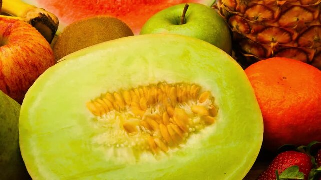4K Video of a fresh green melon with natural texture and vibrant color, representing healthy eating, fresh produce, and nutritious fruit.
