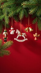 Naklejka premium Classic Christmas Ornaments Hanging from Fir Branches on Red Background
