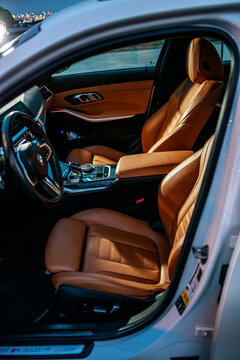 Luxury Tan Leather Interior of a BMW M340i with Carbon Fiber Trim and Modern Dashboard