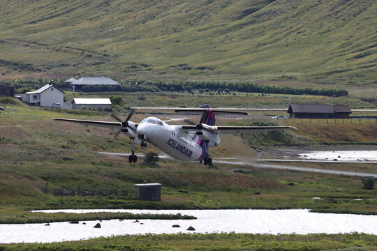 TF-FXH, Icelandair, Bombardier DHC-8-202 Dash 8 Q200, departing Isafjordur Airport, Iceland