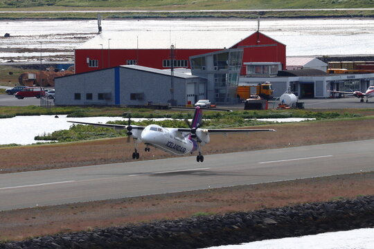 TF-FXH, Icelandair, Bombardier DHC-8-202 Dash 8 Q200, departing Isafjordur Airport, Iceland