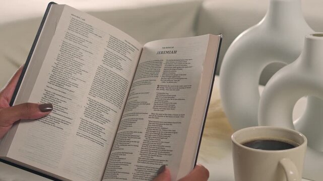 Close Up Of Woman Hands Holding Open Holy Bible Reading Sacred Scripture Quiet Time Faith Devotio