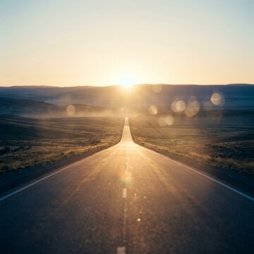 Open road toward sunrise, future planning, progress and new beginning concept