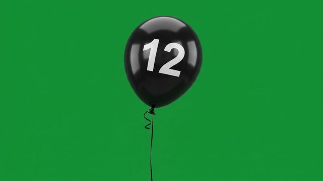 Black Balloon with Number 12 Floating on Green Screen