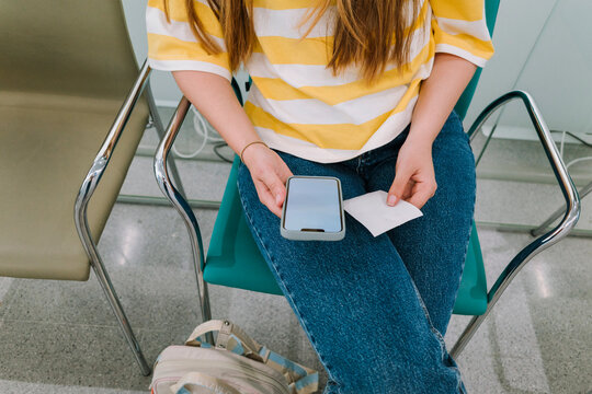 Phone and ticket in waiting room