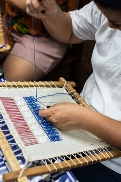 Artisan crafting textile for local small business
