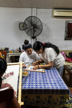Textile mentor creating community skill building