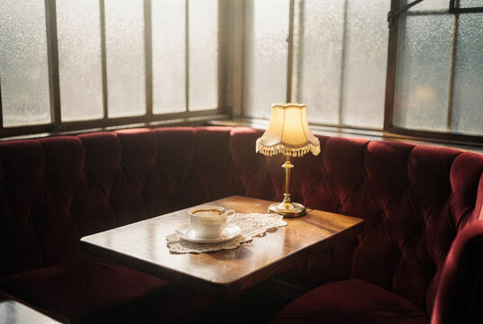 Cozy Vintage Cafe Interior with Coffee and Warm Window Light