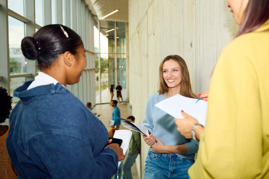 Classmates conversing at the university