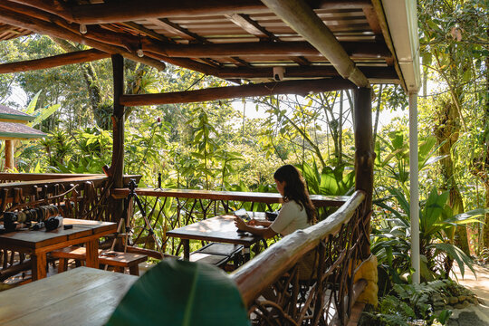 Remote work professional creating content in tropical environment