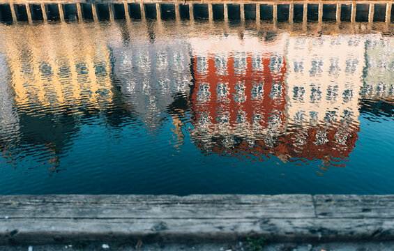 Reflection of traditional colourful buildings in Nyhavn harbour