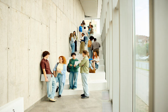 Students Interact in a Modern Building 