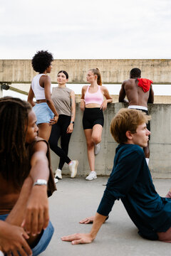 Sports club members relaxing and hanging out together