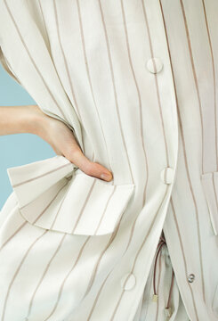Macro Shot of Pinstripe Linen Fabric and Pocket Detail on Vest
