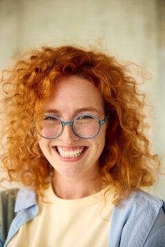 Portrait of a beautiful college woman smiling at the camera