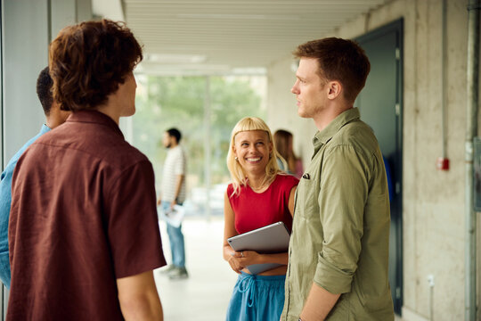 College students talk to each other between lectures