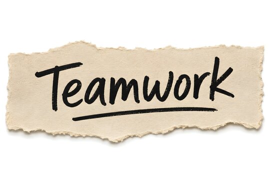 The word Teamwork is written on a torn piece of beige paper, suggesting collaboration and unity.