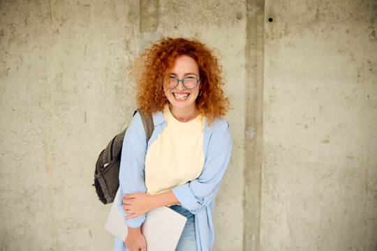 College girl is smiling at the camera