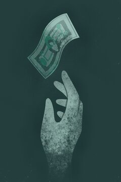 A hand reaching for money