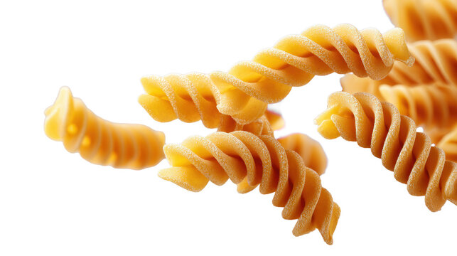 Floating uncooked fusilli pasta spirals close up with detailed semolina texture isolated