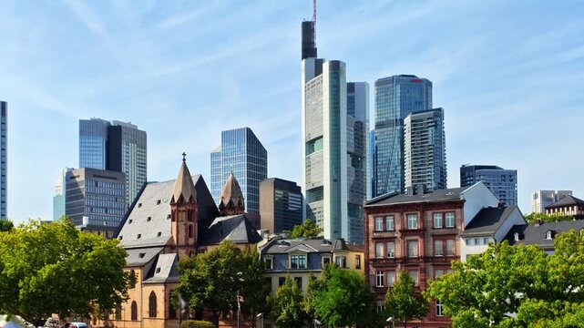 Historic buildings in front of the modern skyscrapers of Frankfurt's financial district