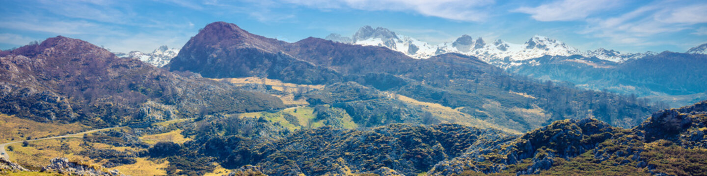 Mountain tops are covered with snow. Panorama of the mountains. National Park Peaks of Europe. Fuente De, Cantabria, Spain