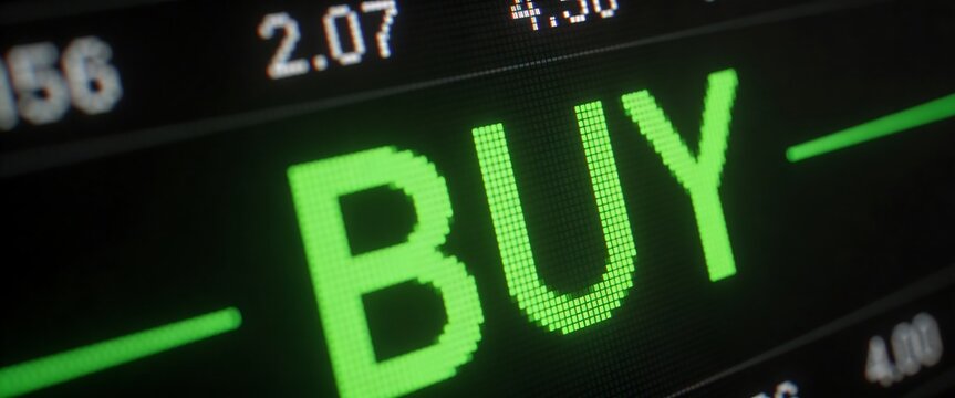 Green buy signal text on digital financial stock market electronic ticker display