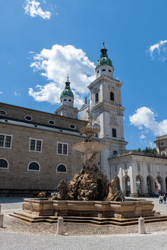 The Residence Fountain and the cathedral in Residenzplatz Square in the heart of Salzburg, Austria