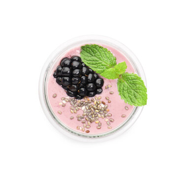 Tasty blackberry smoothie with mint and chia seeds in glass isolated on white, top view