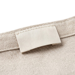 Blank clothing label tag on textured linen on transparent background