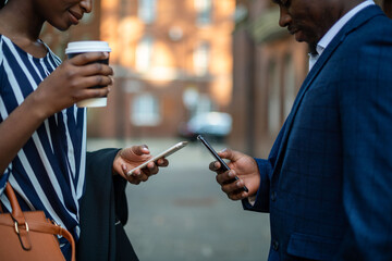 Naklejka premium People connecting through mobile technology.
