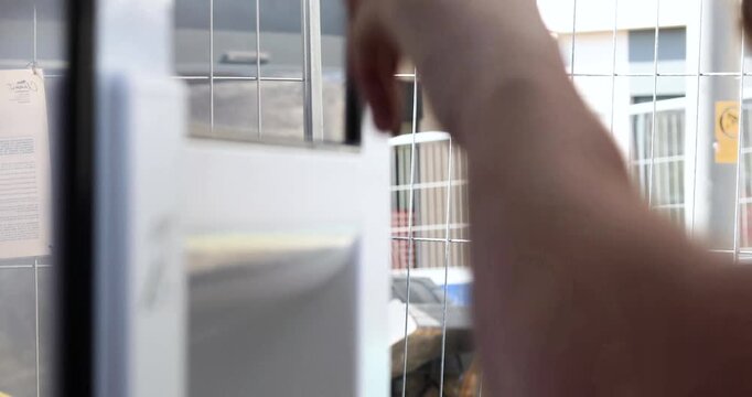 paying for food from a self-service vending machine at a caf&eacute; in Paris on August 11, 2026.