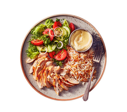  chicken shish taouk served with rice, a fresh green salad