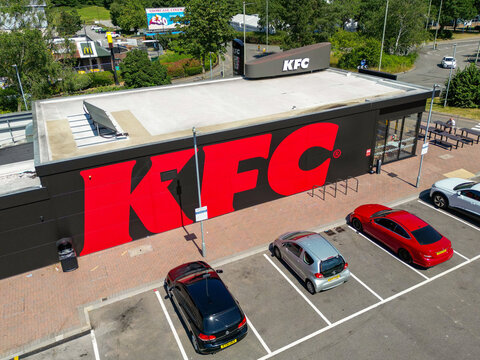 Nantgarw, Rhondda Cynon Taf, Wales - 15 July 2026: Aerial view of the branch of the KFC Kentucky Fried Chicken on Treforest Industrial Estate in south Wales