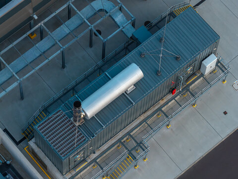 Aerial view of AI data center backup diesel generator housed in an industrial container unit.