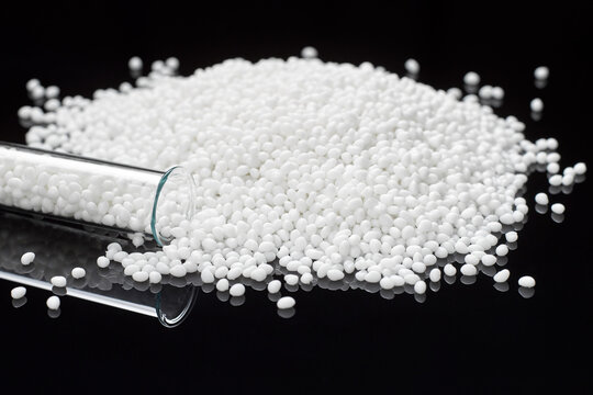 Closeup of a white plastic polymer in granules