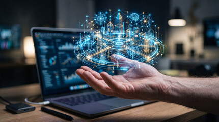 Fototapeta premium Glowing digital cityscape hologram projected above a human hand in a modern office workspace with dark blurred tech background lights