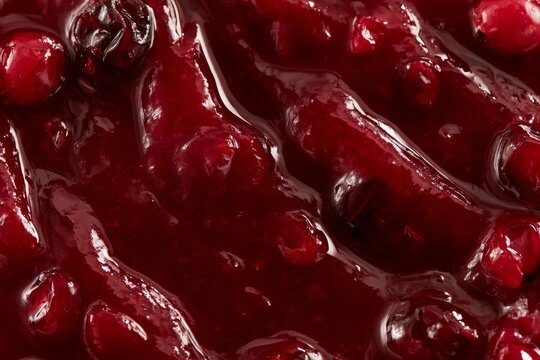 Homemade cranberry sauce prepared for a holiday meal with fresh cranberries and sugar