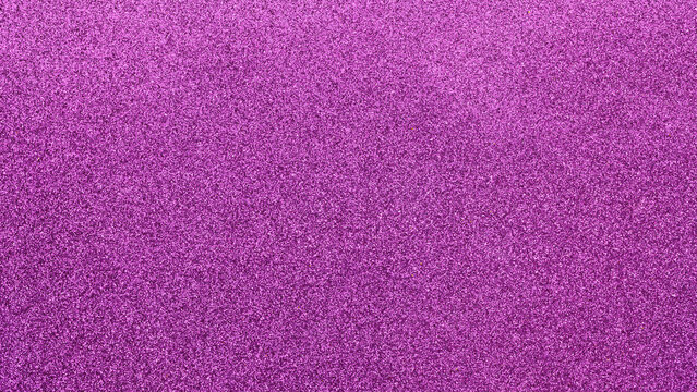 Sparkling magenta purple glitter texture background for festive celebration design