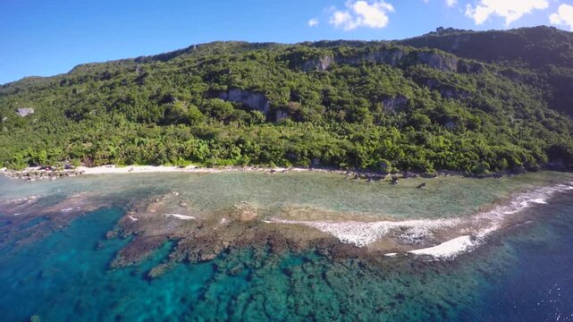 Aerial drone footage, island coast, Rota, Mariana Islands