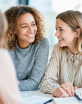 HR advisor counseling employee on education benefits during tuition reimbursement meeting in Professional Workplace