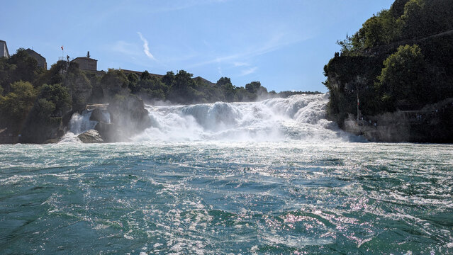 Rhine Falls cascading into the Rhine River in Switzerland. 