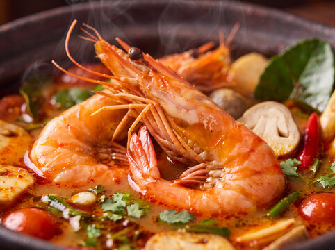 Multi-angle series of authentic Thai tom yum goong seafood soup with copy space
