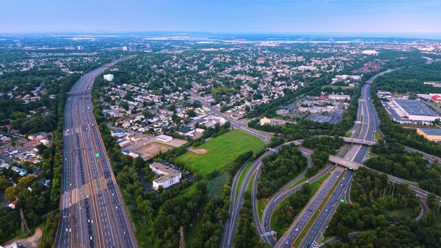 Woodbridge Township in Middlesex County, New Jersey, crossed by the massive highway. The Garden State Parkway and the New Jersey Turnpike are in the view.