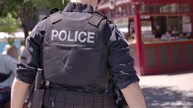Crime and police on the streets suspect handcuffed close upHandcuffed suspect in police custody