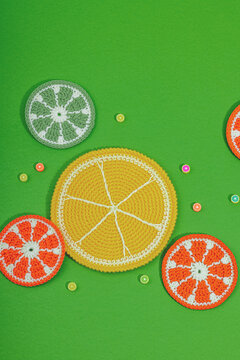 Summer crocheting concept. Handmade coral reef, marine style, underwater animals, green background