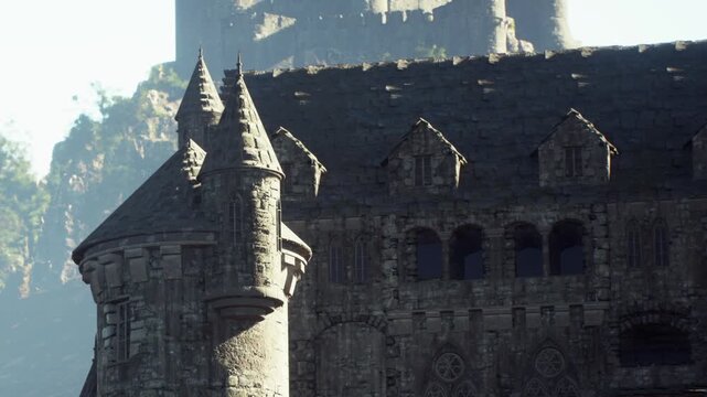 A large stone castle stands on a hill with towers and dark walls. The scene shows trees and hills in the background on a clear day. The castle appears sturdy and historic, drawing attention.